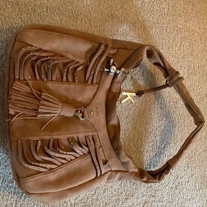 Kenzie tan suede purse 13x10x3 1/2”. In great condition.